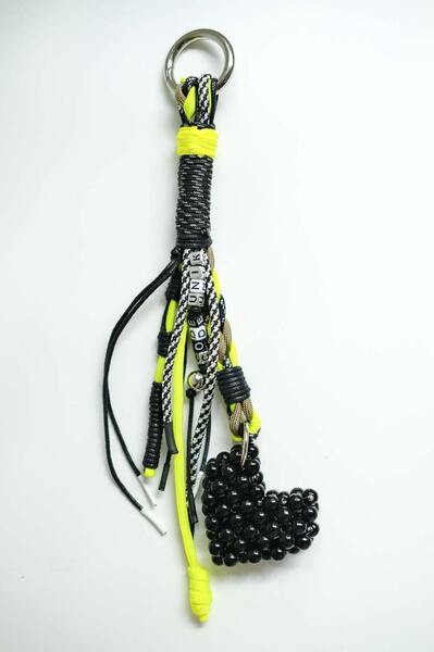 Charm  with yellow accent and black heart