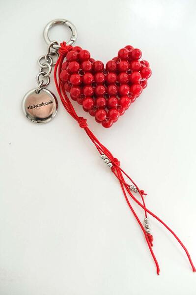 Charm with red-heart and medallion