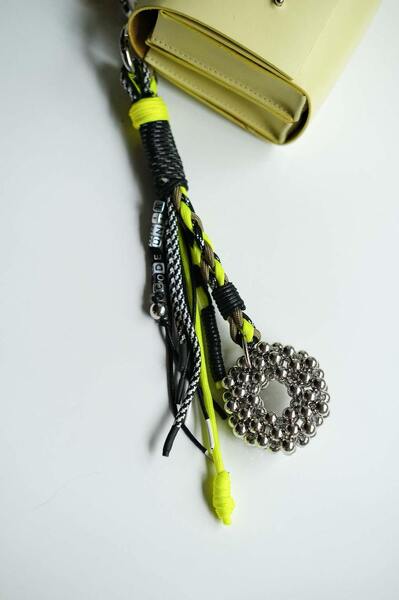 Charm with yellow accent and silver bauble